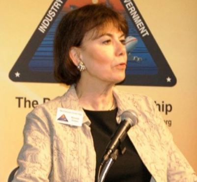 Bonnie Green, Executive Director of The Patuxent Partnership welcomes speakers to the forum.