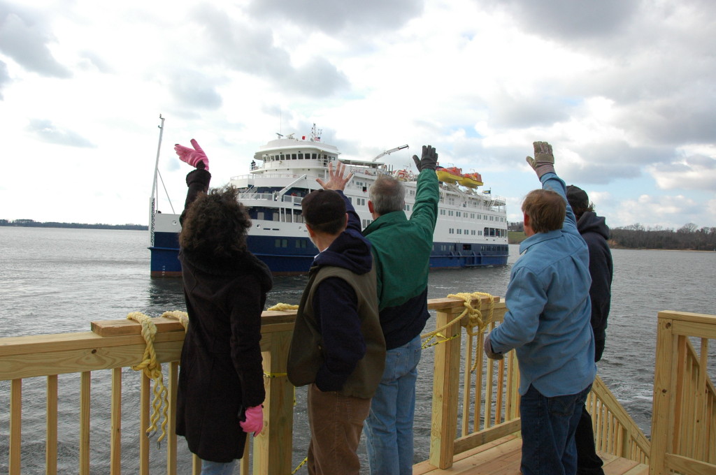 St. Mary’s College of Maryland staff wave farewell Sunday to the Sea Voyager, which housed 240 SMCM students for almost two months. (Photo by Lee Capristo)
