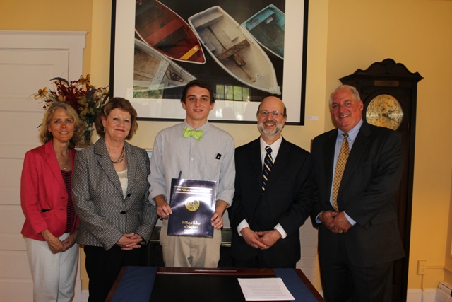 In order from left to right: Mother of Jonathan Bland; Mary Joy Hurlburt, president, St. Mary’s Ryken High School; Jonathan Bland, Joseph and Kathleen Garner Endowed Scholarship recipient; Joseph Urgo, president, St. Mary’s College of Maryland; and Father of Jonathan Bland.