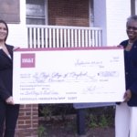 Tuajuanda C. Jordan, president of St. Mary’s College of Maryland (right), accepts a check for the Bookbag to Briefcase program from BB&T. The check was presented by Elizabeth Snyder, vice president at BB&T, St. Mary’s County region.