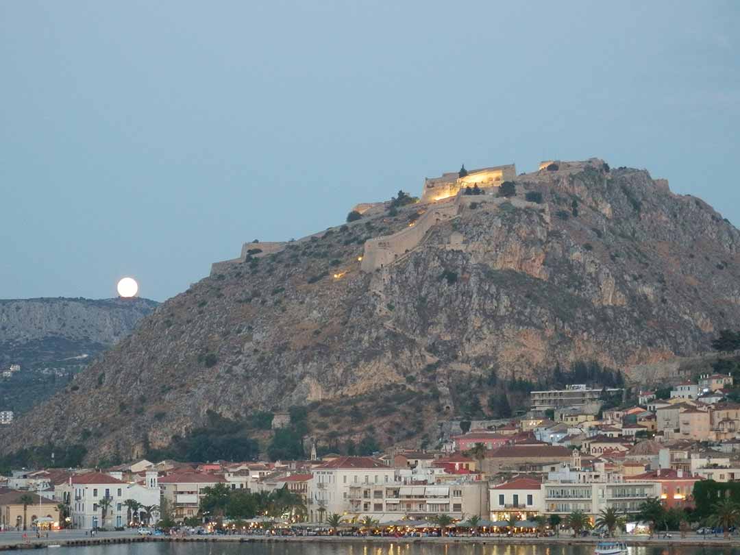 Study abroad photo of a mountain top and town by the water.
