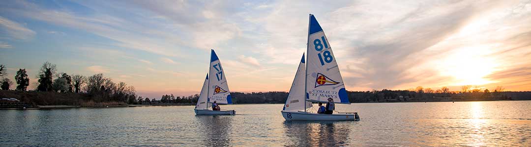 Two SMCM Varsity Sailing boats on the St. Mary's River.