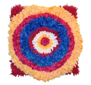 Colorful faux-flower artwork in a circular design