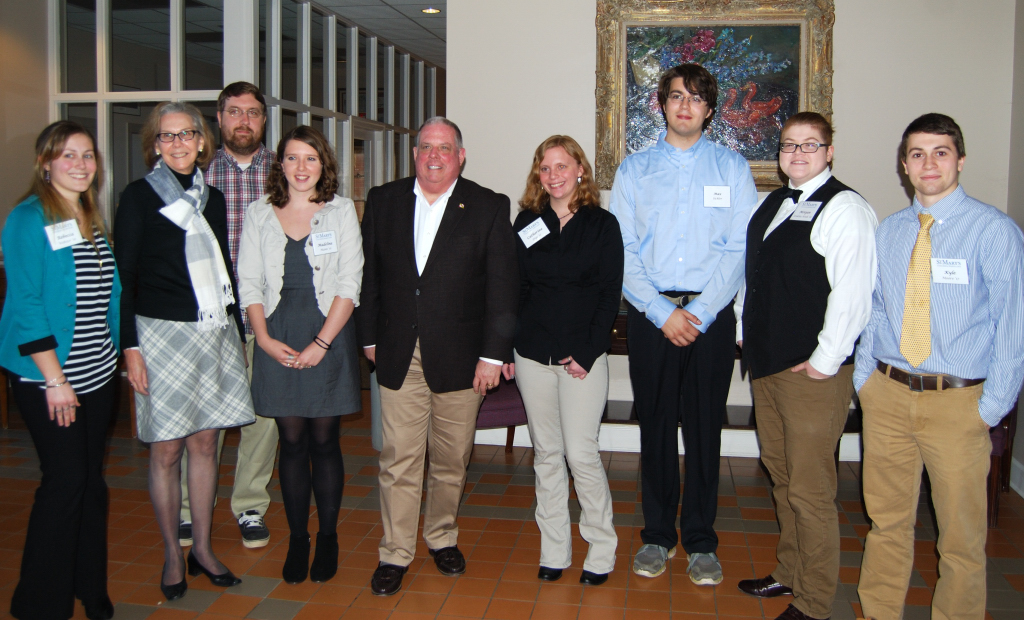 From left to right: Rebecca Webster ('16), Julia King, Scott Strickland ('08), Lina Mann ('16), Governor Larry Hogan, Catherine Dye ('17), Max Sickler ('18), Morgan Jenkins-Houk ('16), Kyle Moore ('18)