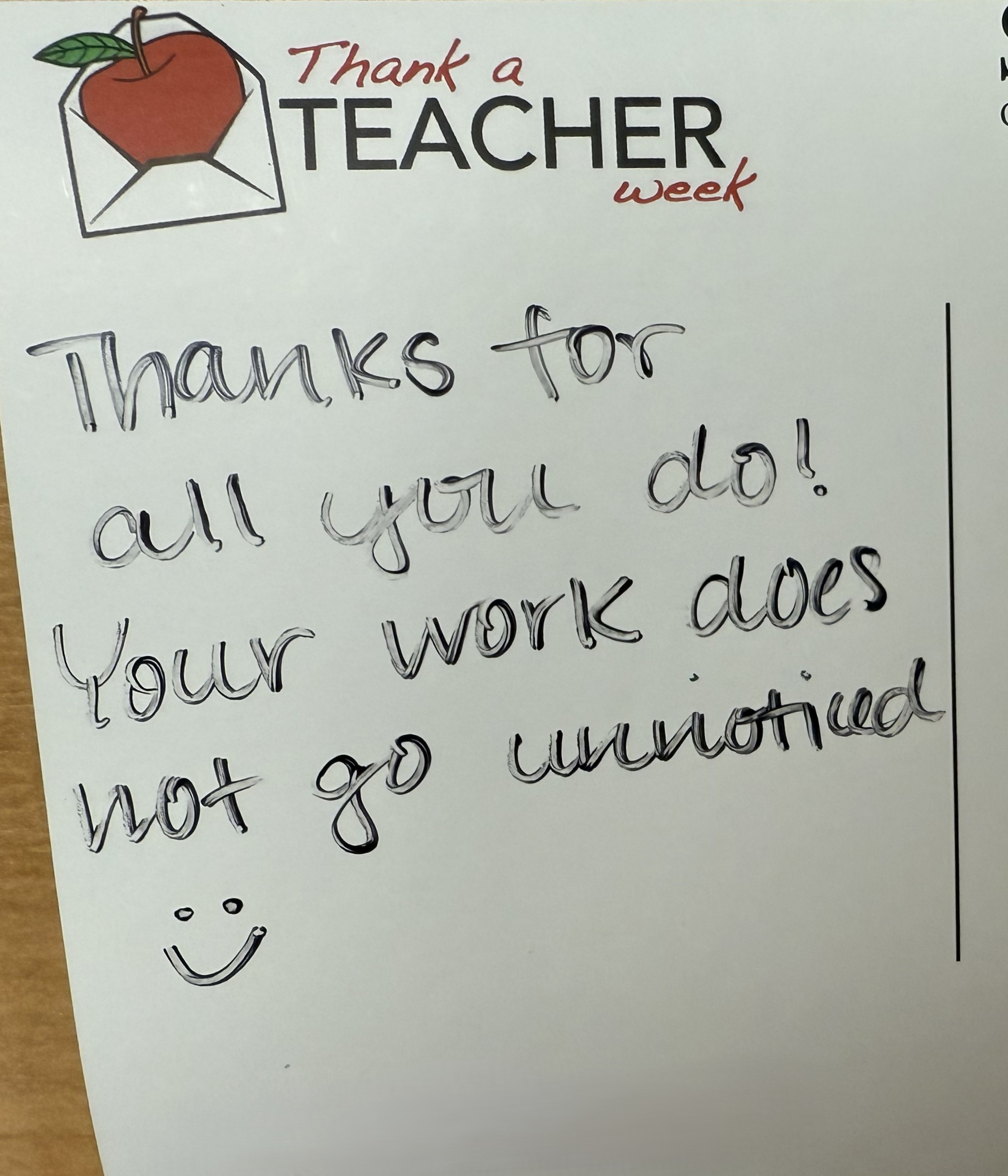 Thank A Teacher Week A handwritten note on "Thank a Teacher Week" stationery reads: "Thanks for all you do! Your work does not go unnoticed :)" with a smiley face.