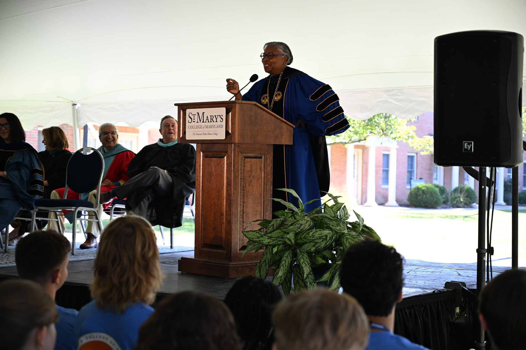 President Jordan address  first-year students from podium
