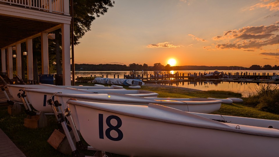 smcm waterfront The SMCM Teddy Turner Waterfront at sunset, showing the boats, paddleboards and dock