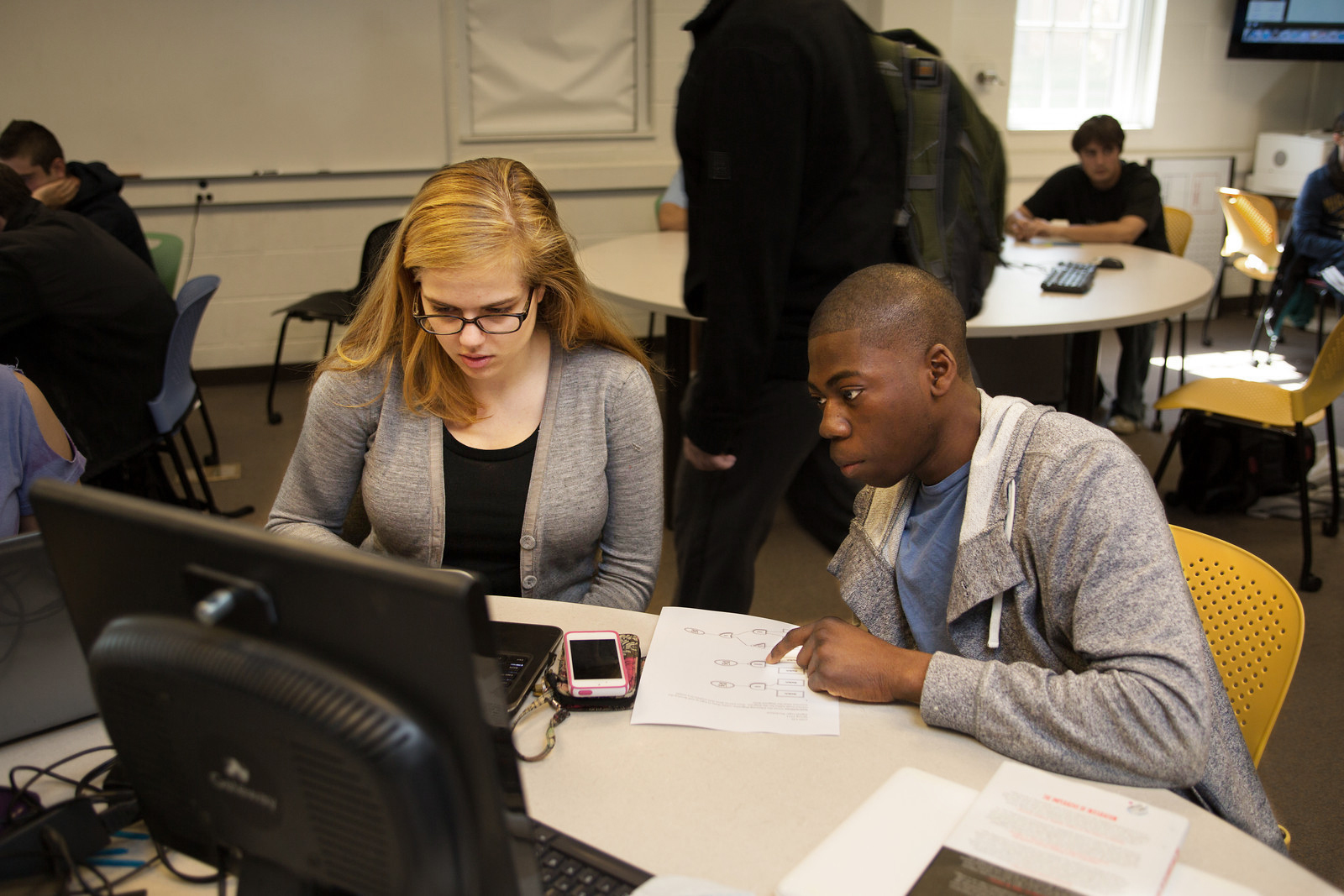Two students working together on a math problem