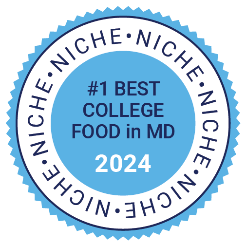 Accolades_2023-24_Niche_Best College Food_Light Blue Blue and white badge reads: "Niche. #1 Best College Food in MD 2024.