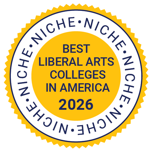 Niche_Best College Food_Gold A gold and white badge reads "Best Liberal Arts Colleges in America 2026" surrounded by the word "Niche" repeated in a circular pattern.
