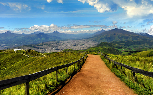 Cuenca, Ecuador - dirt road overlooking mountains on horizon