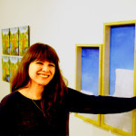 Girl touching painting