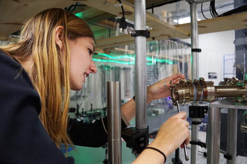 Student with physics instruments