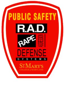 A red and orange badge reads "Public Safety" at the top. The center text displays "R.A.D. Rape Aggression Defense Systems." The bottom text shows "St. Mary's College of Maryland.