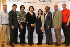 A picture of the professors with CEO, Kurt Heckman