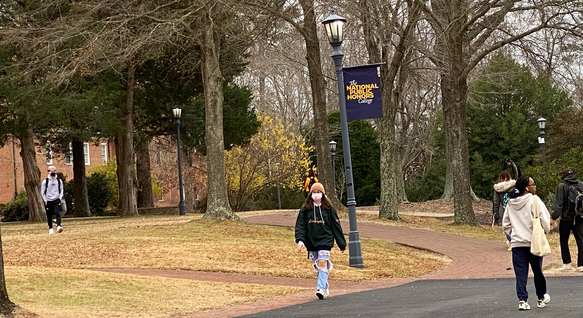 Students walking around campus on a cold winter day