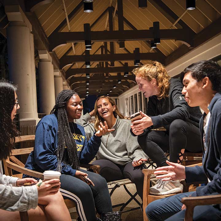 SMCM students chat on the campus center 2nd floor overlook